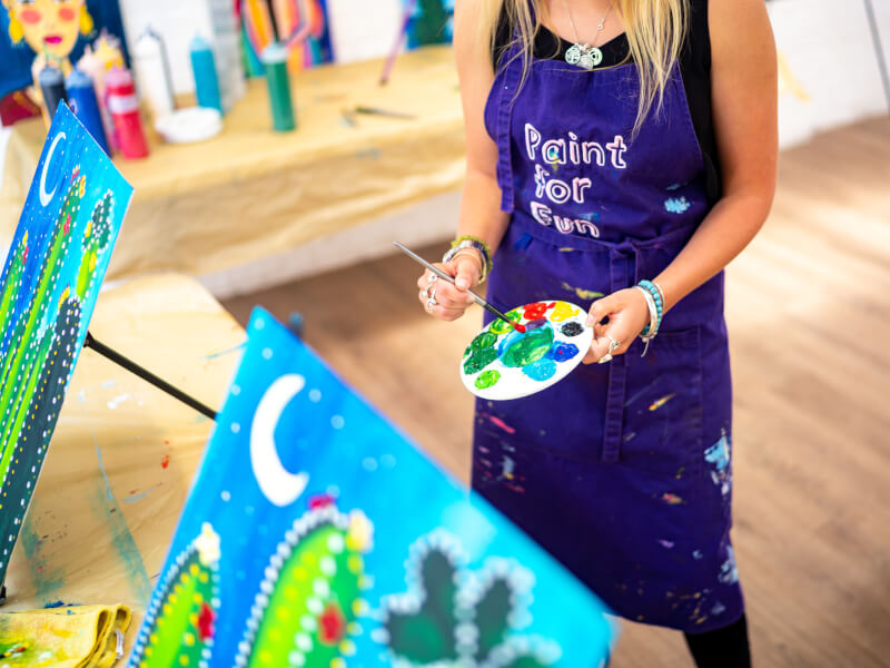 teacher showing art palette